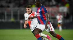 Julian Alvarez (left) of River Plate and Cristian Zapata (right) of San Lorenzo