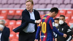Ronald Koeman and Lionel Messi of Barcelona