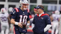 Former New England Patriots offensive coordinator Josh McDaniels (right) and Mac Jones.