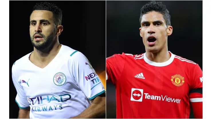 Riyad Mahrez of Manchester City and Raphael Varane of Manchester United