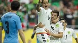Chicharito and Hector Herrera celebrating during a Mexico National Team match