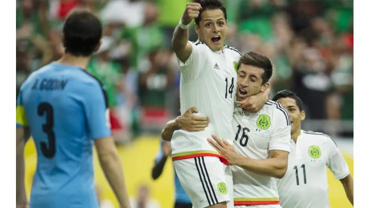 Chicharito and Hector Herrera celebrating during a Mexico National Team match