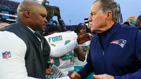 Brian Flores (left) and Bill Belichick.