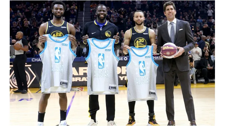 Andrew Wiggins, Draymond Green and Stephen Curry hold their All-Stars jerseys