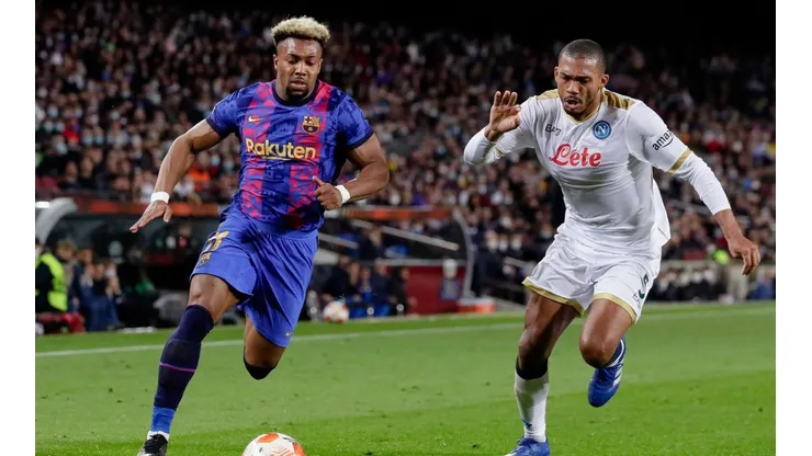 Adama Traore of Barcelona (left) and Juan Jesus of Napoli in the play that resulted in the controversial penalty.