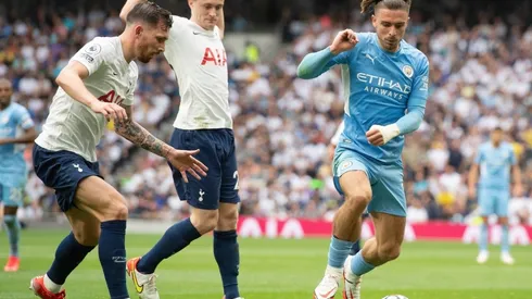 Pierre-Emile Højbjerg of Tottenham Hotspur closes down Jack Grealish of Manchester City