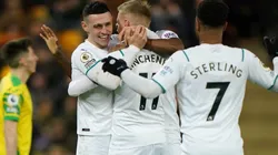 Manchester City's players celebrate after scoring