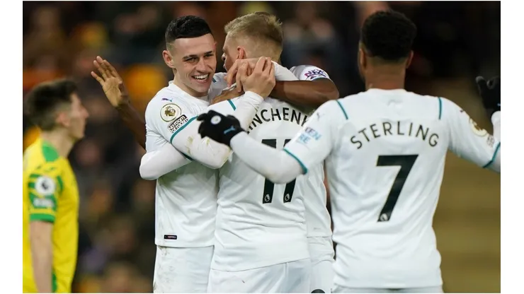 Manchester City's players celebrate after scoring