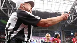 Referee Walt Coleman doing a coin toss in 2018 at the Commanders vs Cardinals game