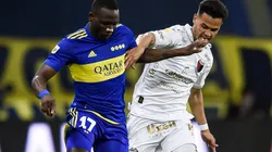 Luis Advincula of Boca Juniors (left) and Cristian Ferreira of Colon (right)