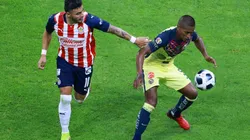 Alexis Vega attempts to steal the ball from Pedro Aquino