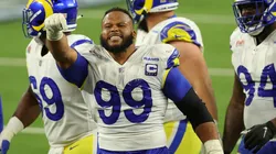 Aaron Donald #99 of the Los Angeles Rams reacts after a sack on Joe Burrow #9 of the Cincinnati Bengals.