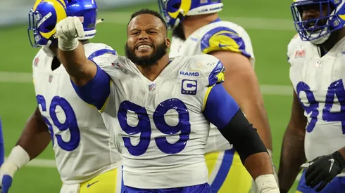 Aaron Donald #99 of the Los Angeles Rams reacts after a sack on Joe Burrow #9 of the Cincinnati Bengals.