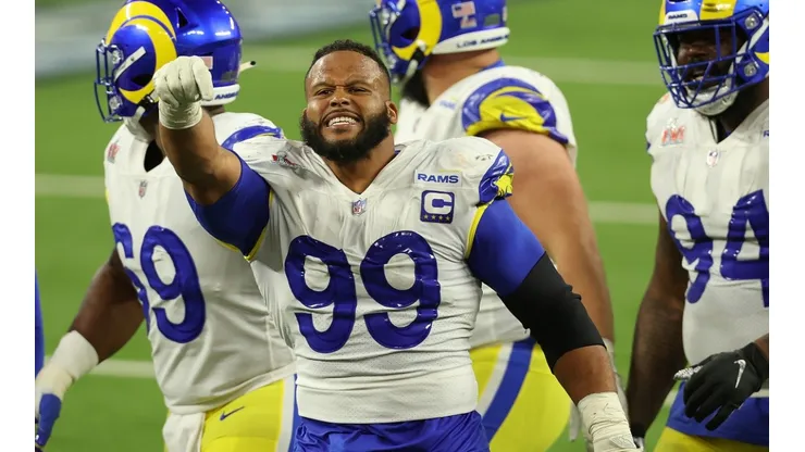 Aaron Donald #99 of the Los Angeles Rams reacts after a sack on Joe Burrow #9 of the Cincinnati Bengals.