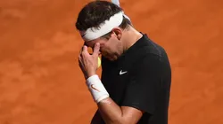 cries during a match against Federico Delbonis of Argentina