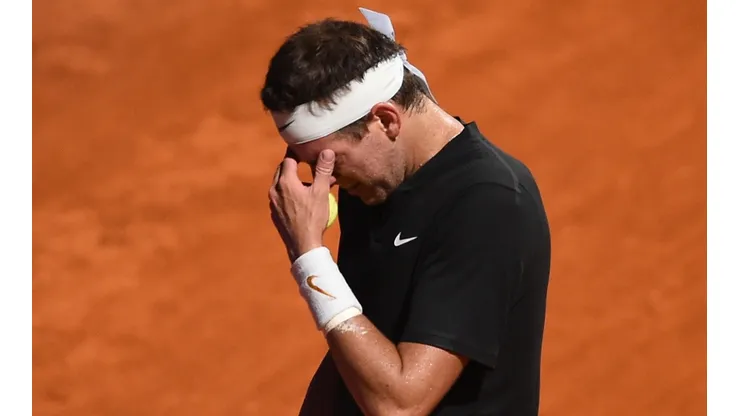 cries during a match against Federico Delbonis of Argentina