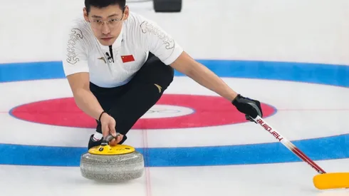 Ling Zhi of Team China during the 2022 Winter Olympics Curling Mixed Doubles