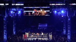 A boxing legend says he is ready to defend his country