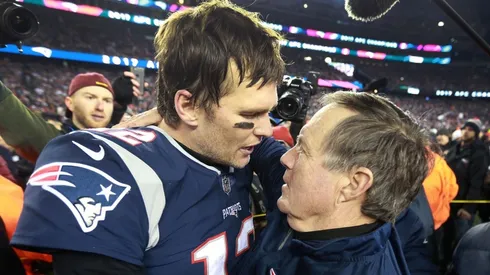 Tom Brady hugging Bill Belichick