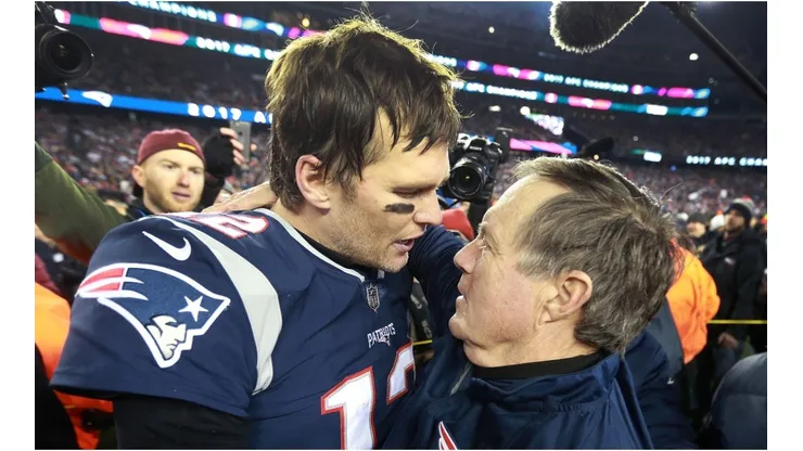 Tom Brady hugging Bill Belichick