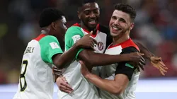Al Jazira players celebrate after scoring