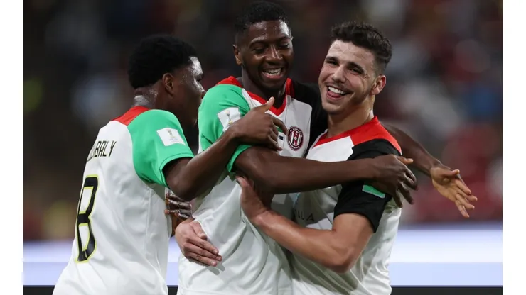 Al Jazira players celebrate after scoring