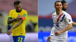 Dani Alves of Brazil and Miguel Almiron of Paraguay