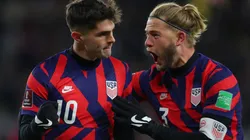Christian Pulisic (left) and Walker Zimmerman celebrate during the USMNT's win over Honduras.