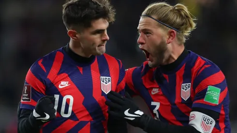 Christian Pulisic (left) and Walker Zimmerman celebrate during the USMNT's win over Honduras.