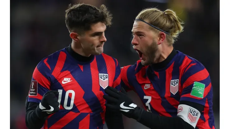 Christian Pulisic (left) and Walker Zimmerman celebrate during the USMNT's win over Honduras.