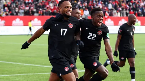 Cyle Larin #17 of Canada celebrates his goal with Richie Laryea #22