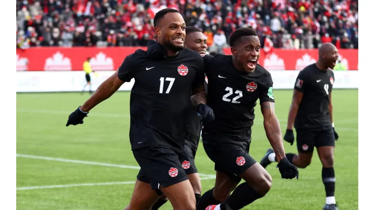 Cyle Larin #17 of Canada celebrates his goal with Richie Laryea #22