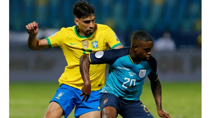 Lucas Paqueta of Brazil (left) against Sebastian Mendez of Ecuador.