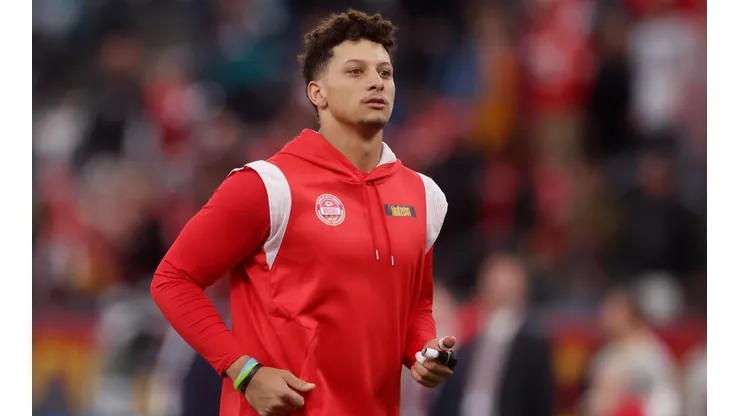 Patrick Mahomes looks on during his warm up to a game.