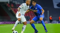 Duvan Vergara of Monterrey fights for the ball with Ignacio Rivero of Cruz Azul.