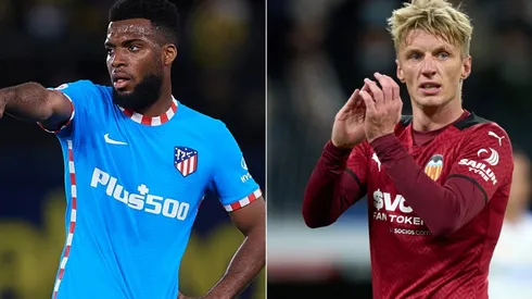 Renan Lodi of Atletico Madrid (left) and Daniel Wass of Valencia (right)