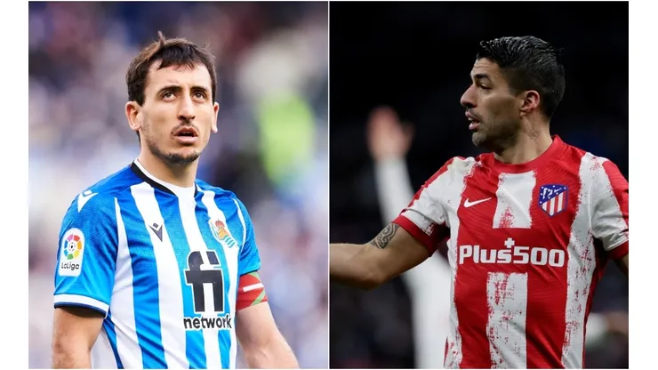 Mikel Oyarzabal of Real Sociedad and Luis Suarez of Atletico Madrid