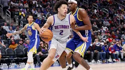 Cade Cunningham of the Detroit Pistons and Kevon Looney of the Golden State Warriors