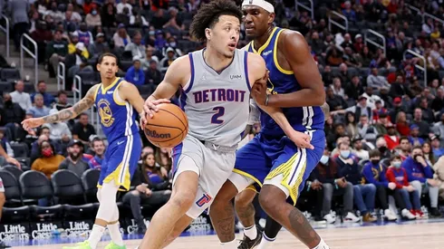Cade Cunningham of the Detroit Pistons and Kevon Looney of the Golden State Warriors