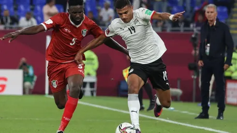 Faisal of Egypt battles for possession Ahmed Ibrahim of Sudan during The FIFA Arab Cup Qatar 2021
