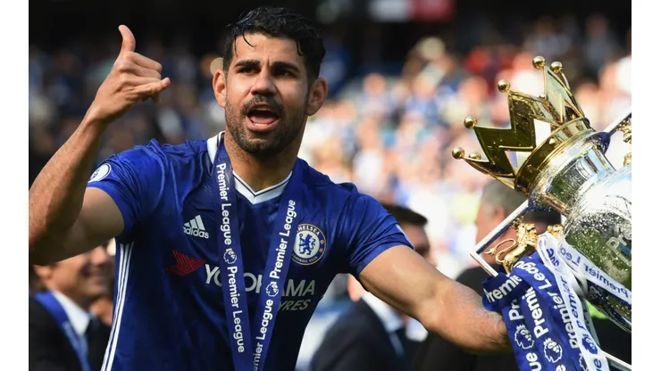 Diego Costa of Chelsea poses with the 2017 Premier League Trophy