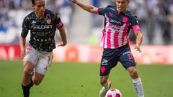 Fernando Gonzalez of Necaxa (left) fight for ball control against Arturo Gonzalez of Monterrey
