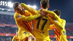 Barcelona players celebrate after scoring
