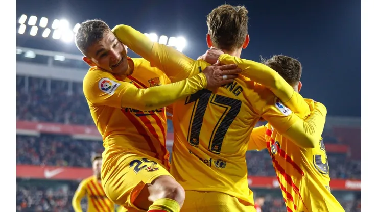 Barcelona players celebrate after scoring