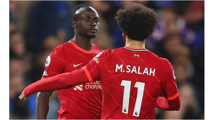 Sadio Mane of Liverpool celebrates after scoring a goal with his team mate Mohamed Salah