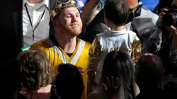 Canelo Alvarez celebrates his Unified World Super middleweight Championship with his son