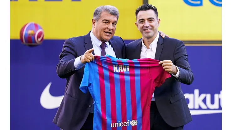 Xavi Hernandez and Joan Laporta