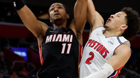 KZ Okpala of the Miami Heat (left) and Cade Cunningham of the Detroit Pistons (right)