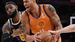 Lebron James of Lakers (left) tries to stop Abdel Nader of Suns