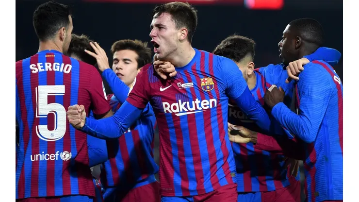 Barcelona players celebrate after scoring
